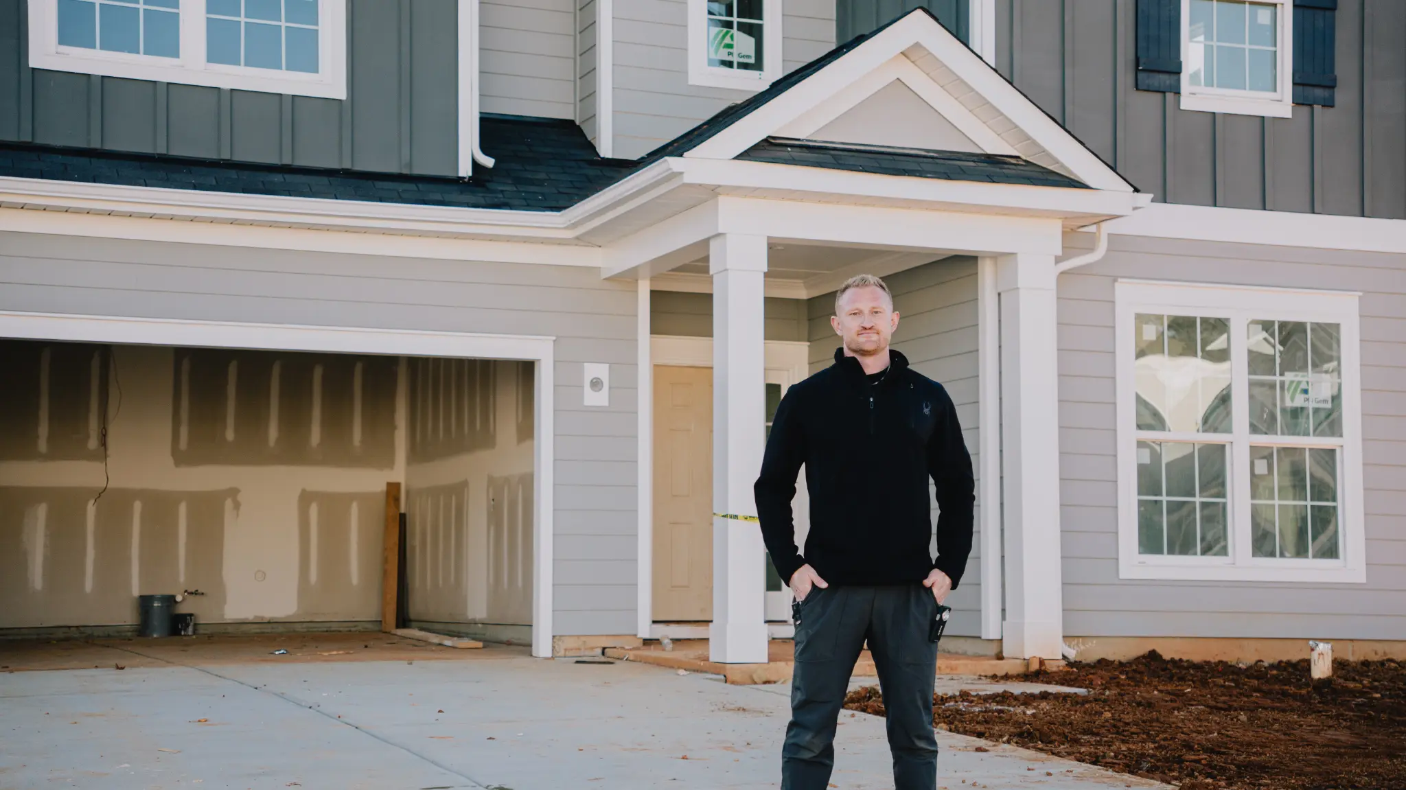 Vaultix inspector at a home exterior